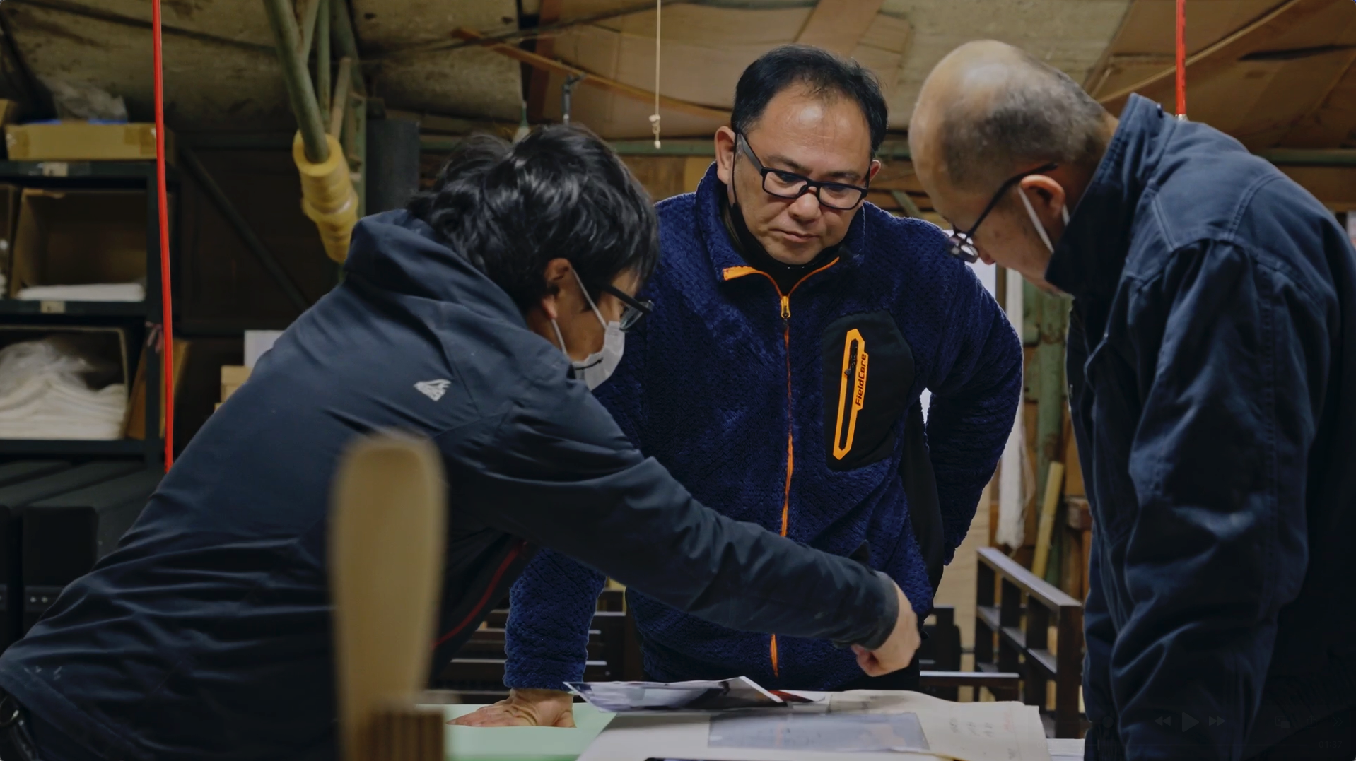 Skilled artisans working on handcrafted furniture in Okawa, Japan.
