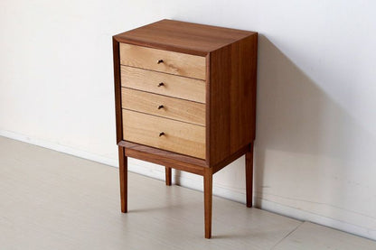 Stylish chest of drawers made of popular woods joined using traditional Japanese techniques.