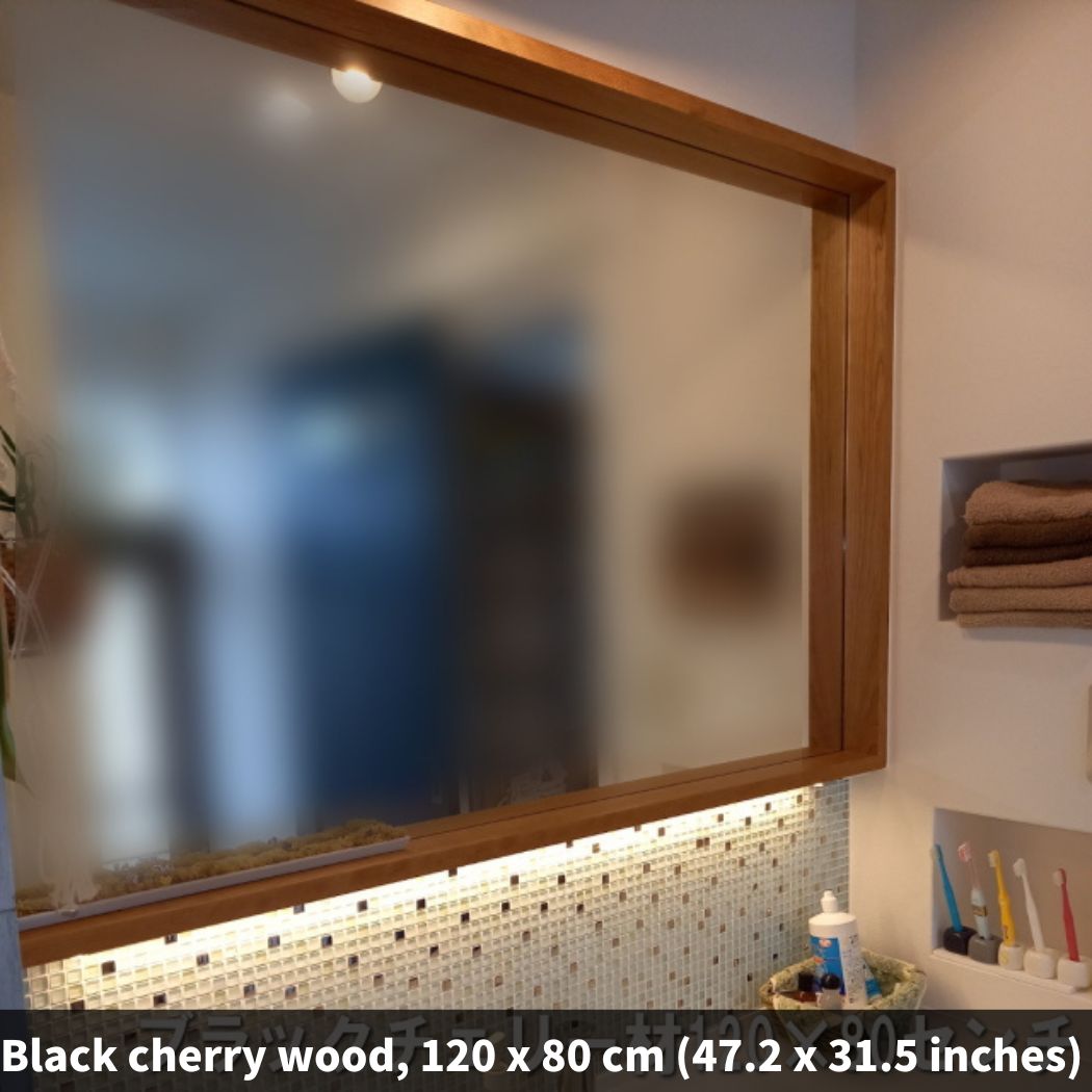 Custom-sized mirror with a Black Cherry frame, known for its elegant wood grain.