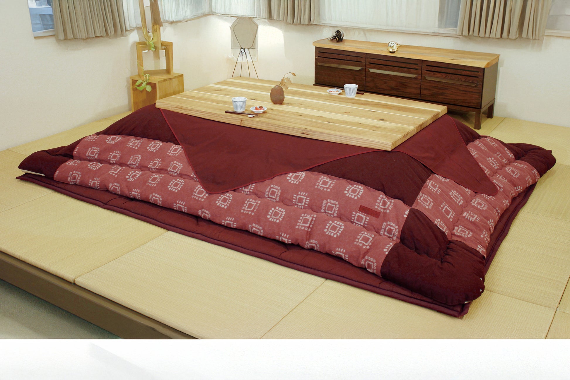 A high-quality Japanese wood kotatsu table in a modern living room setting.